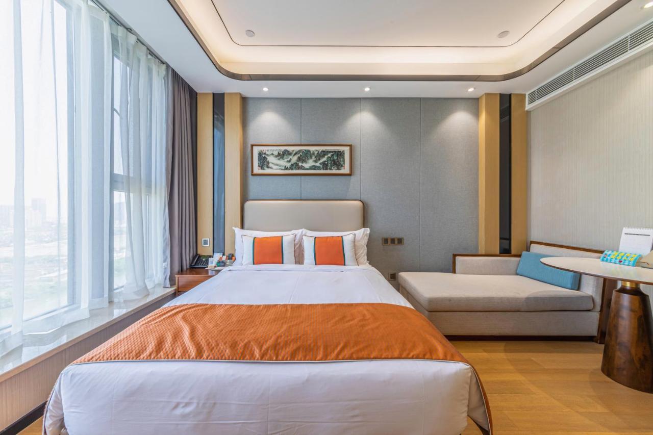 Jinling Funhome Hotel Nanjing Jiulong Lake - Nanjing South Railway Station Esterno foto